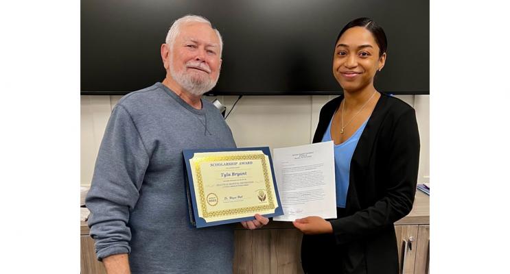 Tyla Bryant, an alumnus of Bellville High School and Prairie View A&M University, was recently presented a $10,500 scholarship by the Bellville Hospital Foundation’s Operations Chair, Dr. Wayne Hall. Bryant will pursue a Doctor of Physical Therapy degree from Texas State starting this summer. CONTRIBUTED PHOTO