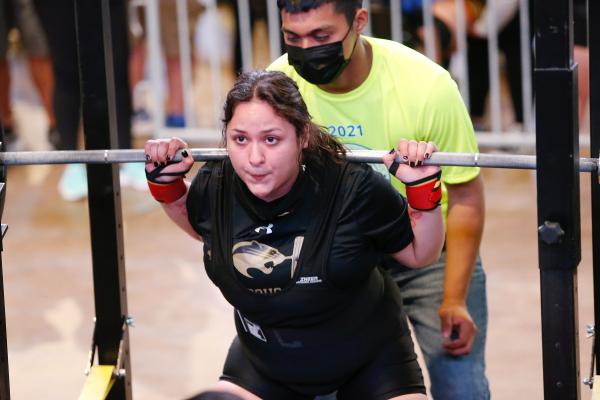 Brazos senior Halie Gonzalez attempts a squat during the Texas High School Women’s Powerlifting Association state championships in Corpus Christi last Thursday. A 15-pound personal record in the squat helped Gonzalez earn third place. (Photo courtesy Ryan Dunsmore/Fort Bend Herald)