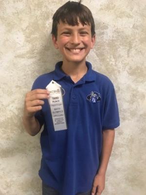 Faith Academy of Bellville fourth grader Luke Kocian earned third place in the reasoning category of the ACSI Math Olympics in March. (Contributed photo)