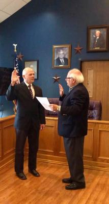 Bellville’s newest Chief of Police, Jason Smalley (left), was sworn in by City Attorney Charlie Smith March 31 in the council chambers. (Contributed photo)