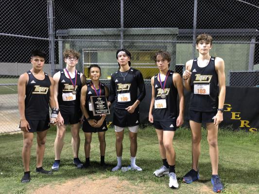 The Sealy Tigers won the varsity boys’ team competition at their host Frio Friday Night Lights meet Aug. 20 at Sealy High School. Pictured from the left are Xavier Olvera, Kevin Culp, Fernando Garza, Daniel Medrano, Gavin Almaguer and Logan Eschenburg. COLE MCNANNA