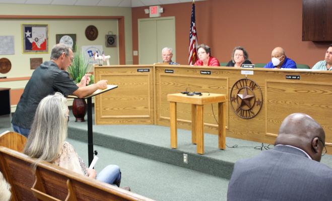 Former Mayor Steve Bockel addressed the council regarding rumors about the dismissal of several city employees. HANS LAMMEMAN