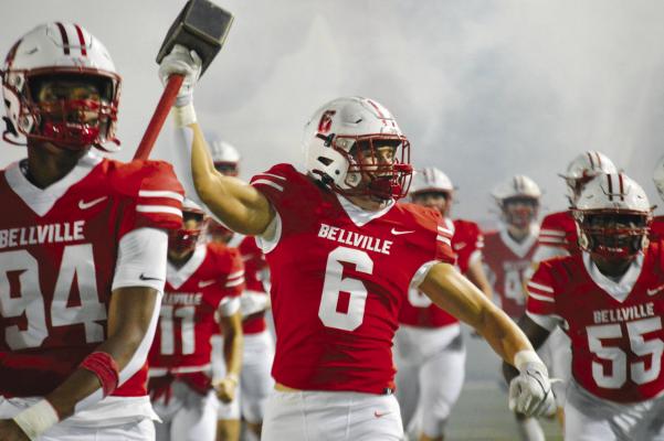 Bellville senior Jacob Shepherd waves a hammer as the Brahmas charge the field for the opening kickoff against Madisonville. Bellville rolled over Madisonville 67-0 and now will face Silsbee this Friday at Planet Ford Stadium in Spring Friday, Nov. 24 at 7:30 p.m. PHOTO BY RICHARD SIRMAN