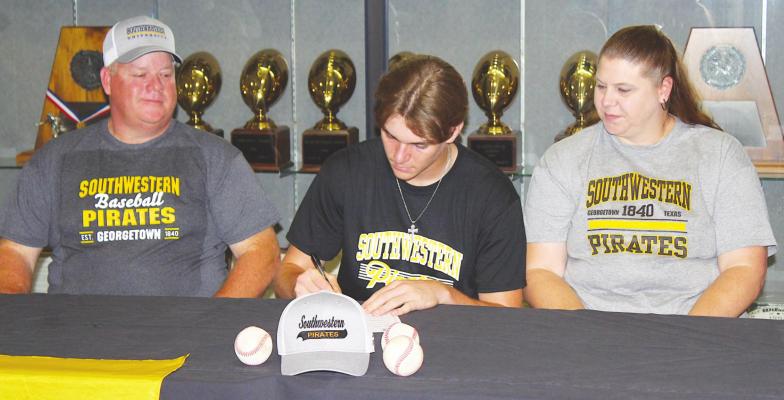 Sealy senior Blake Zaskoda signed his National Letter of Intent to play baseball for the Southwestern University Pirates at a joint signing ceremony at Sealy High School May 19. COLE McNANNA
