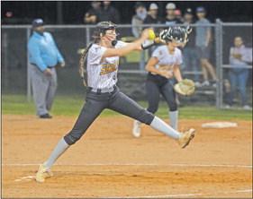 Sealy’s Haylie Eder fires a pitch home. Eder suffered the loss despite a strong out last Monday against Bellville PHOTOS BY JIMMY GALVAN