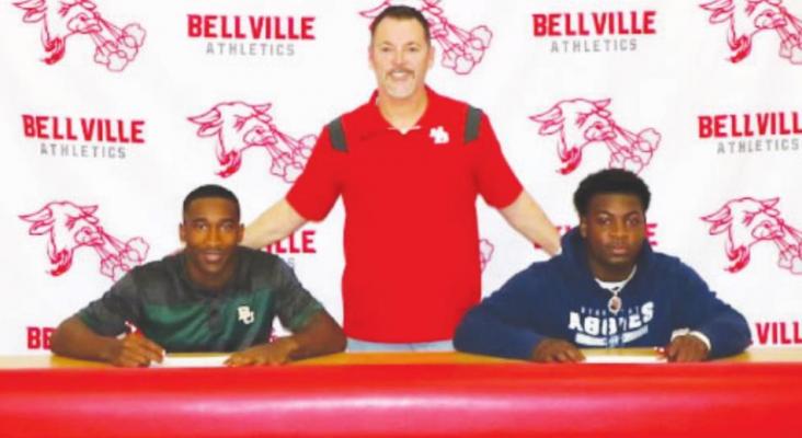 Bellville running backs Richard Reece (Baylor) and Robert Briggs (Utah State) were joined by Brahma Head Football Coach Grady Rowe during their signing ceremony Dec. 15. CONTRIBUTED PHOTO