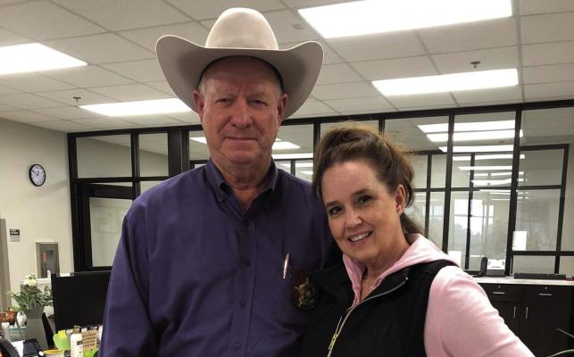 Austin County Clerk Carrie Gregor is pictured with Sheriff Jack Brandes during a goingaway ceremony held after her announcement to resign her post with the county. CONTRIBUTED PHOTO