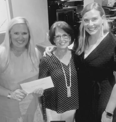 Allison Richardson (left), President of The Bluebonnet Society of Austin County, presents a donation to Marcella Schomburg (center), Chair, Bellville Hospital Foundation, and was accompanied by Angela Hoppe, Vice-President of The Bluebonnet Society at the annual ladies’ Spring Social. CONTRIBUTED PHOTO