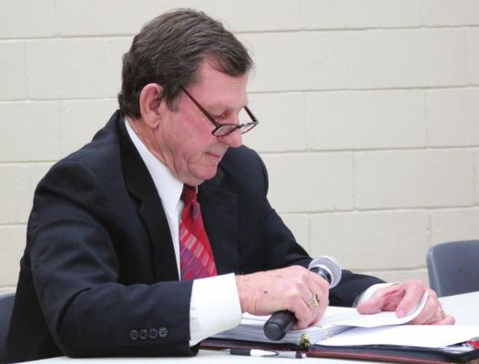 Sealy City Manager Lloyd Merrell reads a statement during a special meeting of the city council on Nov. 30, 2020, in which he asked them to let him do his job or else terminate his employment. File photo