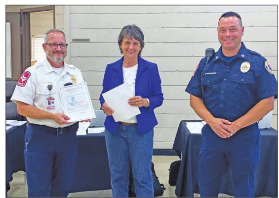 Proclamations Honoring First Responders Week May 15 through 21, as well as National Public Works Appreciation Week on the same dates were presented at the Sealy City Council meeting on May 17 by Mayor Carolyn Bilski. Pictured left to right, ACEMS Chief Walter Marrow, Mayor Carolyn Bilski and Gary Stansbury. RAE DRADY