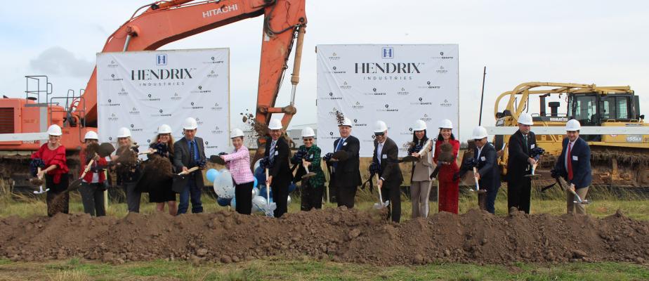 Representatives from Hendrix Industries, the City of Sealy and Austin County, among others, all grabbed shovels and hard hats during the groundbreaking ceremony held Friday morning. HANS LAMMEMAN