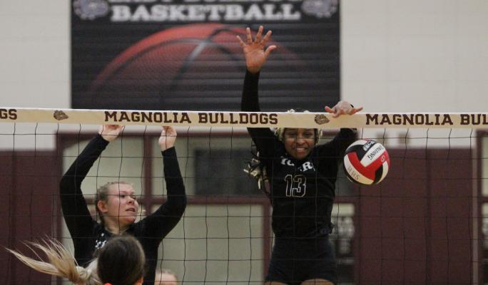 Sealy junior Jasmyne Joiner delivers a block during the Lady Tigers’ Area Championship against Huffman Hargrave in Magnolia Nov. 4. Joiner was one of two Sealy representatives to land on the all-district first-team.