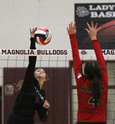 Lady Tiger senior Katie Wagoner provides a spike at the nut during Sealy’s second-round playoff match against Huffman Hargrave Nov. 4 in Magnolia. Wagoner was one of three Sealy representatives on the all-district second-team.