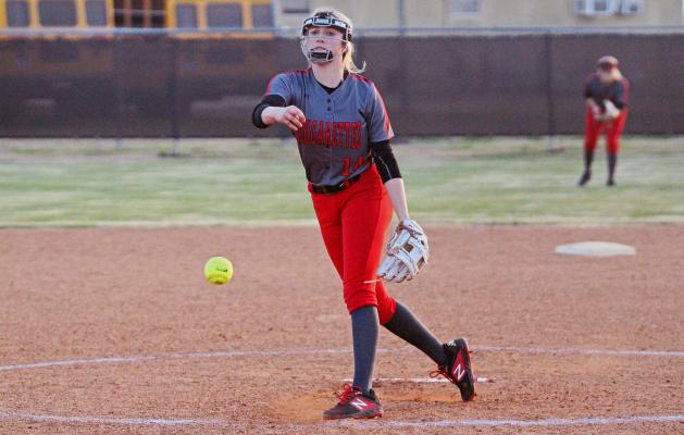 Brazos junior Taylor Brzozowski fires a pitch during the Cougarettes’ non-district game against Royal at home Feb. 22. COLE McNANNA