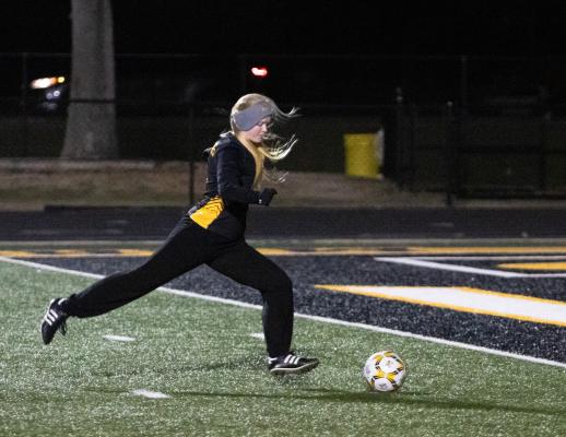 Sealy freshman Elizabeth Reichardt lines up a penalty-kick opportunity in the first half of the Lady Tigers’ regular-season finale against Royal at T.J. Mills Stadium Friday night, March 11. COLE McNANNA