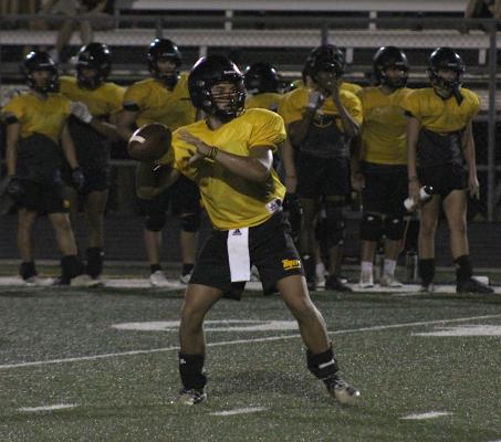 Sealy quarterback D’vonne Hmielewski loads up for a pass during the Tigers’ Midnight Madness Practice Aug. 7 at T.J. Mills Stadium. Hmielewski was among signal-callers who were up for a fan poll for preseason quarterback of the year as awarded by VYPE Houston. COLE McNANNA