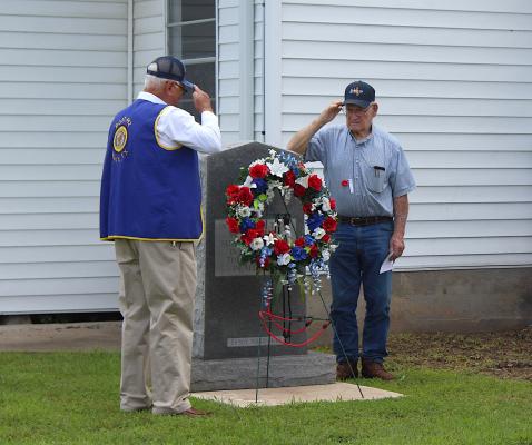 A wreath is laid “In memory of those who made the supreme sacrifice in defense of their country in all wars,” as part of the Sealy American Legion’s Memorial Day ceremony Monday, May 31. COLE McNANNA