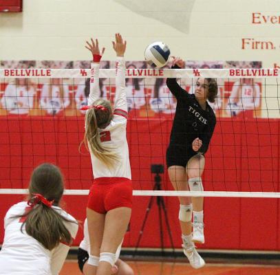 Lady Tiger sophomore Annabelle Williams connects on a spike during Sealy’s district match against Bellville on the road Oct. 15. Williams was one of two Lady Tigers to land on the all-district first-team.
