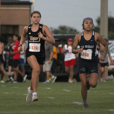 Sealy freshman Blair Konesheck was one of two Lady Tiger participants in the varsity girls' race at their host Frio Friday Night Lights meet last Friday. COLE McNANNA