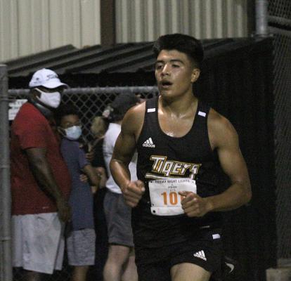 Sealy senior Xavier Olvera was the Tigers' top finisher in the varsity boys' race at last Friday's season-opening meet at home. COLE McNANNA