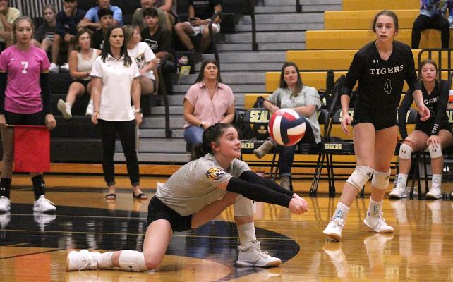 Sealy senior Bailey Koy goes low to record a dig during the Lady Tigers’ non-district match against Mayde Creek at home Aug. 31. Koy was named the District 24 Defensive Player of the Year when all-district awards were released. PHOTOS BY COLE McNANNA