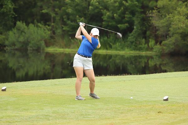 Blinn freshman Madeline Goad loads up a drive during the NJCAA Women’s Golf Championship at Plantation Bay Golf and Country Club in Daytona, Fla. last week. COURTESY PHOTO