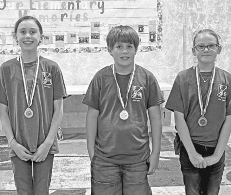 Faith Academy’s science fair winners: first place Eve Hyslop, second place Nolan Wunderlich, and third place Natalie Rokohl. CONTRIBUTED PHOTOS