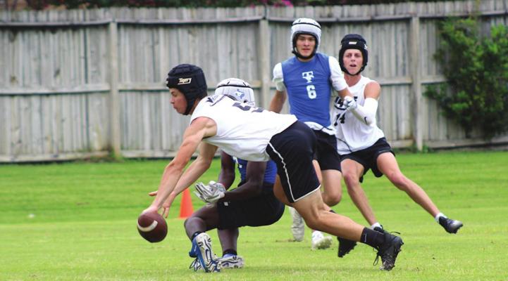 Jeffrey Neu breaks up a pass intended for a Taylor receiver Wednesday, June 30, in the final 7-on-7 action for Sealy.