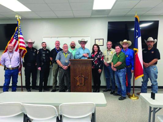 On Thursday, Nov. 3, Woodman Financial Representative Dorothy Dunsworth presented the Austin County Sheriff’s Office an indoor set of the United States and Texas flags with stands to be displayed proudly in our training/meeting room. “The Austin County Sheriff’s Office greatly appreciates the flag donation and support we receive from WoodmenLife in Bellville,” said Austin County Sheriff Jack Brandes. CONTRIBUTED PHOTOS