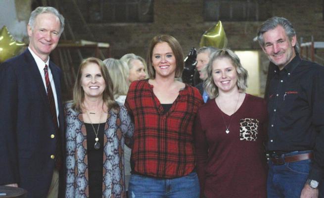 The Austin County Insider magazine commemorated its first issue with a launch party in downtown Sealy last Wednesday, Jan. 13. Attendees included Judge Daniel Leedy, left, and Jeff Virnau, right, who celebrated alongside staff Karen Lopez, Amanda Luksha and Amy Lieb. PHOTOS BY COLE MCNANNA