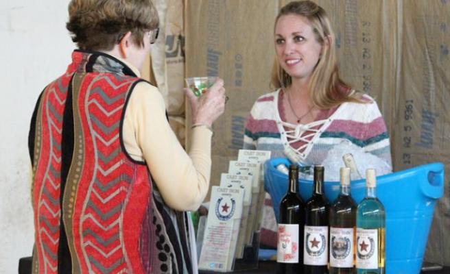 Chelsea Humes of Cast Iron Winery was one of the vendors that greeted guests at the Austin County Insider magazine launch party last Wednesday, Jan. 13, in downtown Sealy.