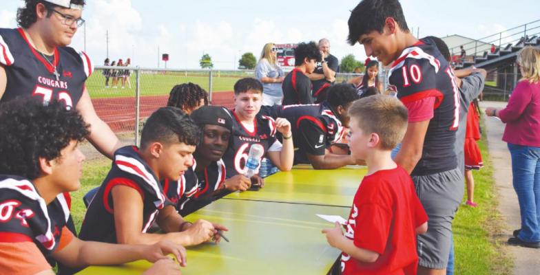 Members of the Brazos Cougar football team met fans and signed autographs at the Meet the Cougars event at Cougar Stadium Monday night in Wallis. CONTRIBUTED PHOTO