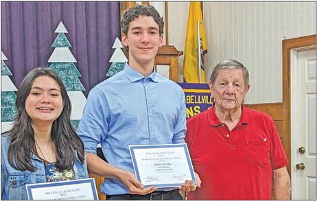 Faith Academy students that participated in the Lions Club’s essay contest included Maddie Halverson, who placed second winning a $1,000 scholarship, and Jonah Taake, who placed first and won a $2,000 scholarship. They are pictured with Lion’s Club representative Newton Boriack. CONTRIBUTED PHOTO