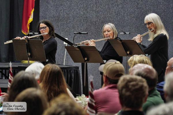 Flautist trio added sparkle to Austin County Civic Chorale ‘s 40th season dinner concert at Faith Academy on Dec. 13. L to R: Leah Cessna, Roxanna Collier and Marie McElroy.