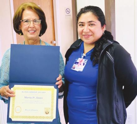 Bellville Hospital Foundation Board Chair Marcella Schomburg recently presented the first BHF scholarship to Maria Jasso. CONTRIBUTED PHOTO