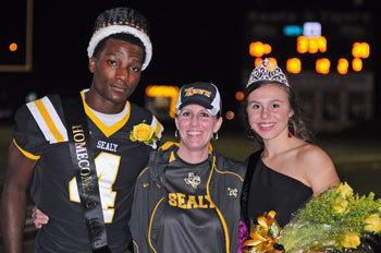 Ricky Seals-Jones, the former Sealy High School Homecoming king, will become the first Sealy-born NFL player to make a Super Bowl when the Chiefs take on the Buccaneers this Sunday in Tampa Bay. Pictured is Seals-Jones with Sealy High School principal Megan Oliver (center) and Homecoming queen Caroline Owen on Sept. 14, 2012. (File photo)