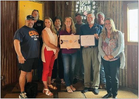 Front row, left to right, are Dave Carrasquillo, Charlie Wade, Mindi Snyder, Russ Rainwater, Chelsea Humes. Back row, left to right, are Tom Mendenhall, Becky Bosse, Pat Dennen, Macgregor Main. This award was from the Rotary District Governor Mindi Snyder for small club of the year. (Not pictured Shelly Main, Jonny Bonaccorso) SUBMITTED PHOTO