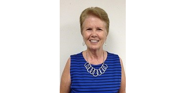 LOIS L. MANN