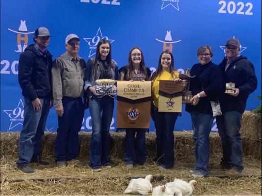 Sealy High School’s Kenna Schram won Grand Champion at the Houston Livestock Show and Rodeo’s 2022 Junior Market Poultry Show last Friday, March 11, with her Pen of Broilers. CONTRIBUTED PHOTO