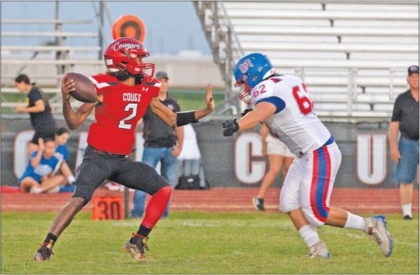 Brazos quarterback Bryson Bennett sidesteps a Nixon-Smiley defender during Friday’s victory over the Mustangs. The win moved Brazos to 4-0 on the season with the district opener looming this Friday against Van Vleck. PHOTOS BY JIMMY GALVAN