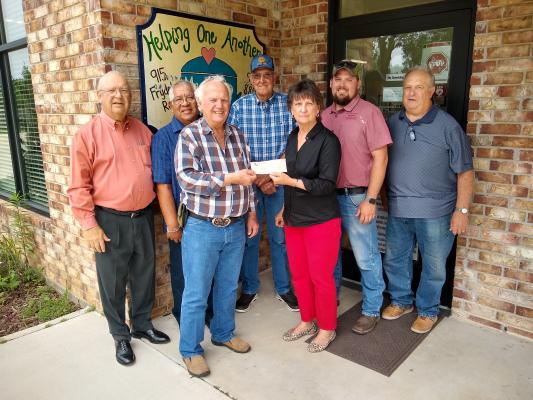 Sir Knight Andy Felchak, Faithful Navigator, is pictured presenting the donation to Carolyn Bilski, president of Austin County HOA Meals on Wheels. In the back row from left to right are SK Joe J. Marusik, Faithful Comptroller, SK Joe Lemos, Terry Ashorn, Meals on Wheels board member, SK Dustin Konesheck, Faithful Purser, and SK Edward Klecka. CONTRIBUTED PHOTO