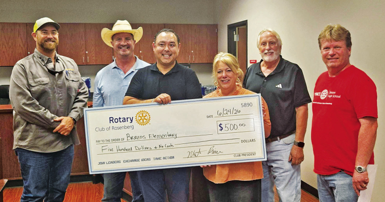 Representatives of the Rotary Club of Rosenberg recently presented a $500 donation to the Brazos Elementary School literacy program. The funds were raised through the club's annual Gumbo Fest and fall gun raffle. Pictured are Rotary Club members Bradley Stavinoha, Norbert Matthew Rivera and Darren McCarthy. COURTESY PHOTO
