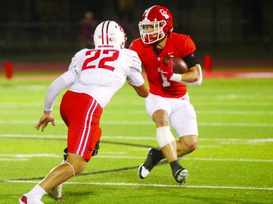 Grayson Rigdon looking for an opening before breaking a 10-yard run.
