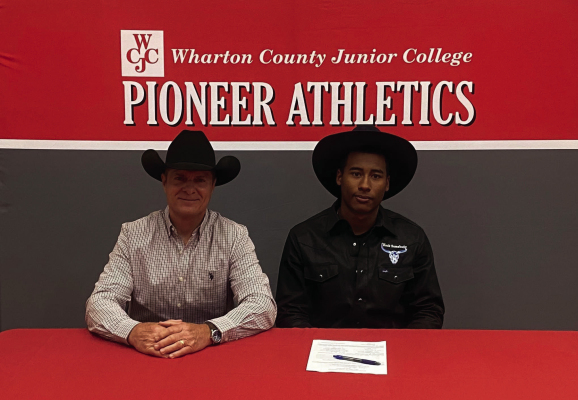WCJC Rodeo is proud to announce the signing of Cash Reid, right, to the 2026-2027 team. Cash is from Wallis and competes in the bull riding event. Reid is pictured with WCJC Rodeo Coach Sean Amestoy. COURTESY PHOTO