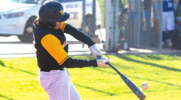 Tiger senior Jose Bludau connects on a pitch during Sealy’s District 24-4A game in Brookshire against the Royal Falcons Friday, March 25. COLE MCNANNA