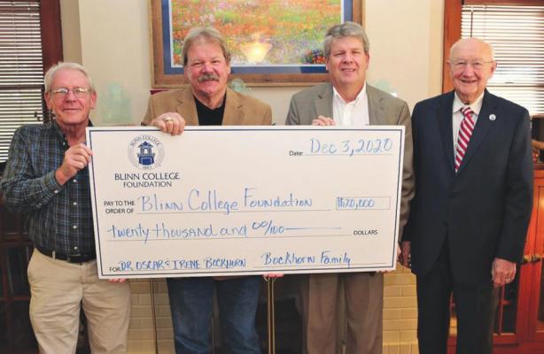 The Bockhorn family gifted $20,000 to the Blinn College Foundation for an endowed scholarship in honor of Dr. Oscar and Irene Bockhorn. Pictured from the left are their sons Ken Bockhorn, Don Bockhorn, and David Bockhorn, and Hal Machat of the foundation board of directors. Contributed photo