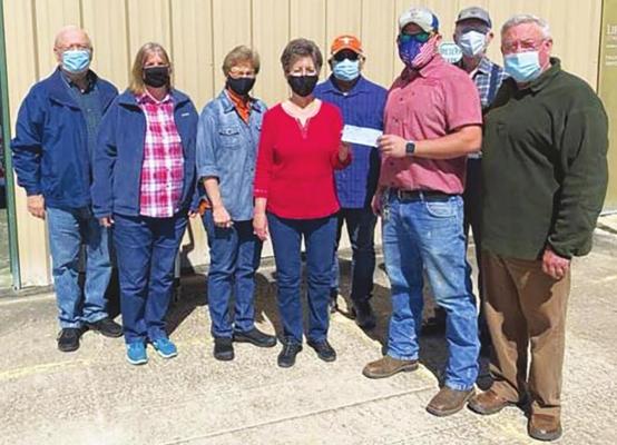 The Sealy Knights of Columbus presented a $684 check to the Sealy Christian Food Pantry from the Feb. 25 fish fry profits. Pictured from left to right are Joe Marusik, Sue Kritynik, Sherri Santoro, Patsy Tomasek, Joe Lemos, Dustin Konesheck, Albert Brown, and Robert Kent. CONTRIBUTED PHOTOS