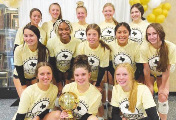The Sealy Lady Tigers secured their second straight bi-district championship with a win over North Forest Monday. Pictured in the front row from the left are Emersyn Cryan, Bailey Koy and Courtney Roberts. In the middle row from the left are Emily Askew, Jasmyne Joiner, Blair Kram, Krystal Bludau and Annabelle Williams. In the back row from the left are Katie Wagoner, Grace Eschenburg, Breanna Brandes, Julia Jurecka and Avery Dittert. COURTESY PHOTO