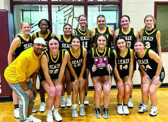 The Sealy Lady Tigers came home with the first-place trophy from the Ganado tournament this weekend. COURTESY PHOTO