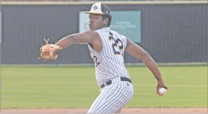 Sealy’s Demarques Thompson fires a pitch home. Thompson started game two against Bay City last week in Wharton. PHOTOS BY JIMMY GALVAN